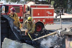 Photo of two CalFire firefighters at the Eaton Fires in Altadena, California from January 2025